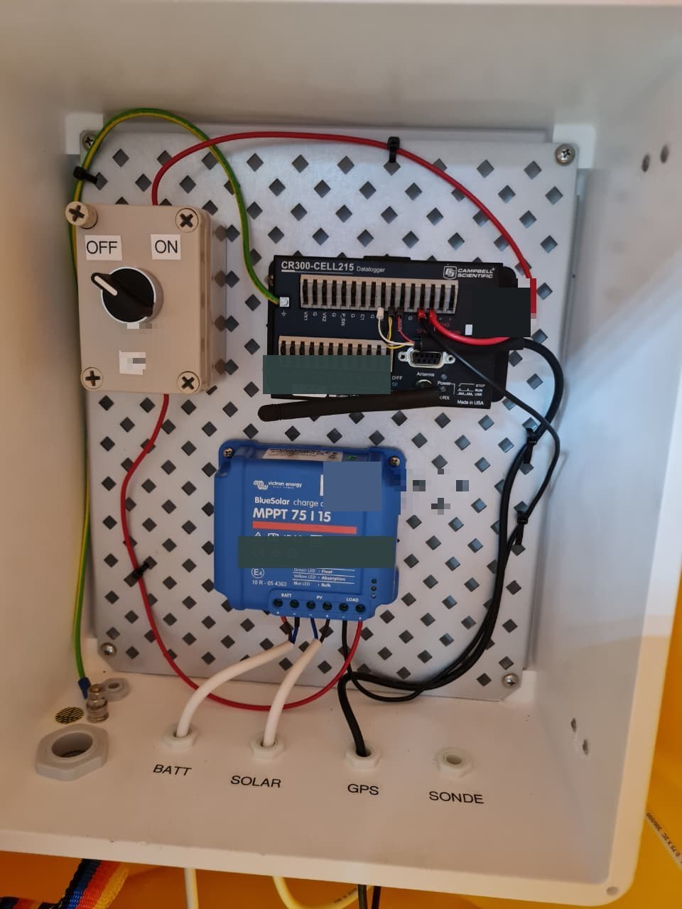 CR300-CELL215 logger and solar charge controller inside a buoy cabinet
