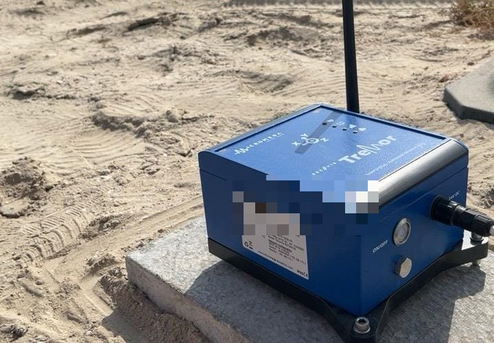Deployed vibration-monitoring sensor on a concrete base at Ras Al Khor